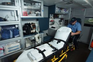 EMT sitting in ambulance