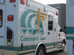 Sideways parked Community Care Ambulance